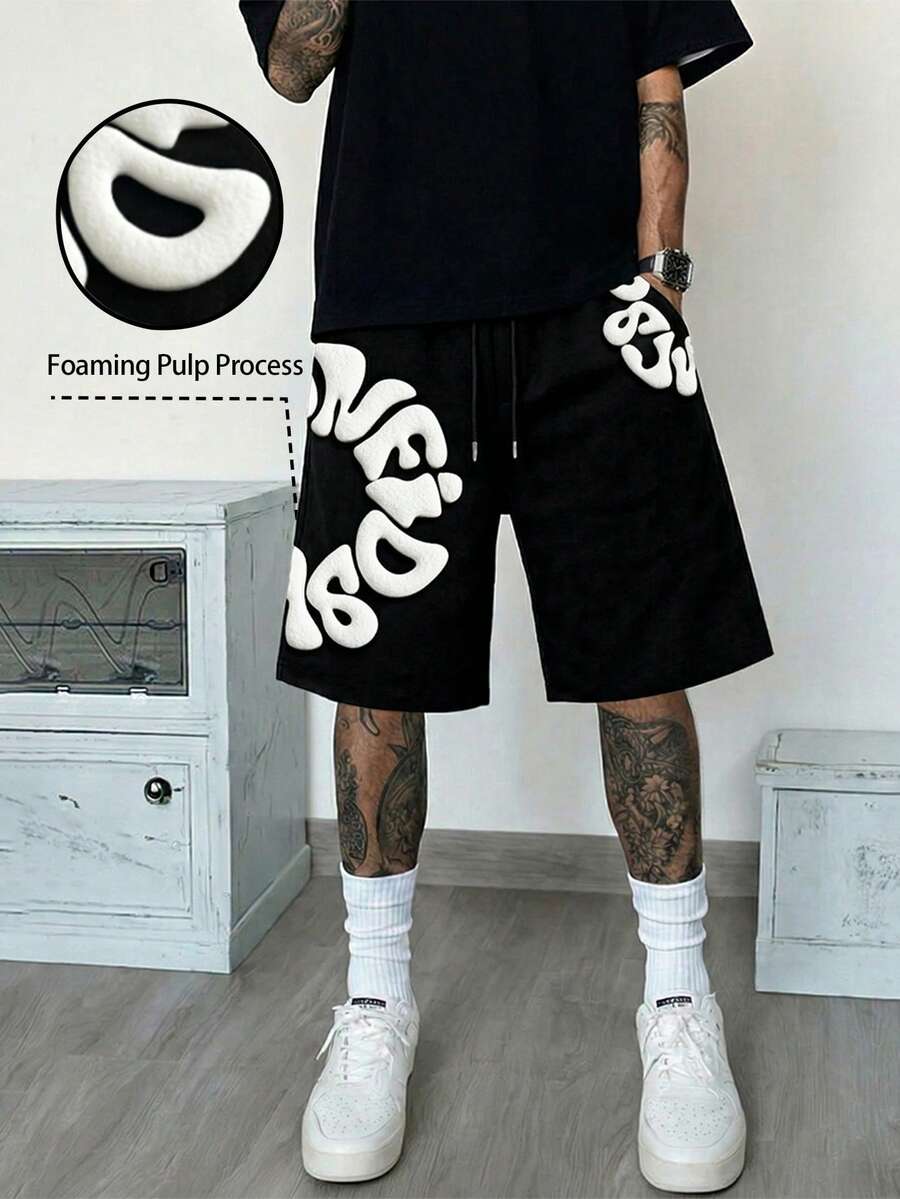 Manfinity EMRG Men's Summer Black White 3D Foam Puff Print Letter Logo Graphic Shorts Foaming Pulp Process Bubble Text ONE Typography Vintage Y2K 2000s Style Streetwear Hip Hop Urban Harajuku Casual Vacation Holiday Beach Party Going Out Club Festival Concert Drawstring Elastic Waist Knee Length Oversized Loose Fit Wide Leg Baggy Breathable Soft Comfortable Artistic Creative Unique Edgy Cool Fashion Shorts For Men,Men's Letter Print Drawstring Waist Pocket Shorts - Black - View 1