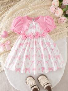 Đầm ngắn tay màu hồng phối nơ dễ thương, thoải mái, kiểu dáng thường ngày cho bé gái. - Hồng - Xem 9