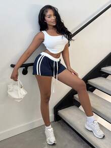Alexandranx Quần short bó sát in số màu xanh navy cho nữ, màu tương phản ở eo, có trang trí ruy băng bên hông, phù hợp mặc đi chơi, mùa xuân/hè - Màu xanh hải quân - Xem 6