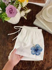 Comfortcana Quần short nữ 100% cotton in họa tiết hoa dâm bụt màu xanh cổ điển - Hoàn hảo cho mùa hè ở đảo Hawaii, các lễ hội âm nhạc, dã ngoại bãi biển, kỳ nghỉ hè, những ngày nghỉ mát bên bờ biển trắng xóa, dễ thương và mềm mại. - trắng - Xem 5