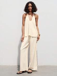 SHEIN Luminelle Bộ đồ nữ mới gồm áo cổ chữ V, dây buộc sau lưng, quần ống rộng và dây rút bên hông, kiểu dáng thường ngày gợi cảm, thích hợp cho mùa xuân/hè. - Màu be - Xem 3