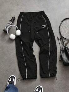 BATMAN X SHEIN Sport MetroGents Quần nỉ nam in hình hoạt hình, cạp chun, có dây rút - màu đen - Xem 1