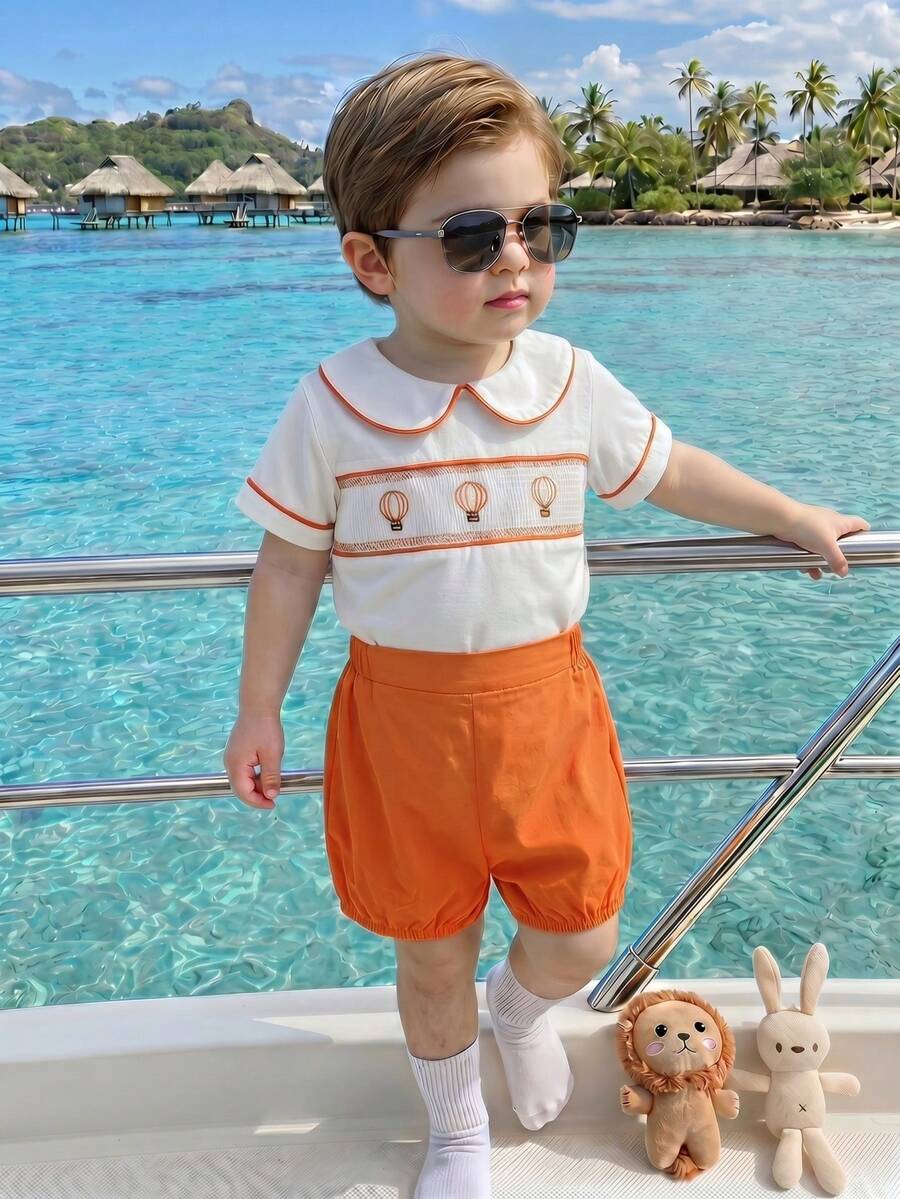 SHEIN Playful Pals 两件套男婴幼儿套装:翻领汽车印花衬衫搭配蓝色梭织短裤,适合派对、婚礼、花童装扮,绅士又可爱。 - 珊瑚橙 - 查看 1