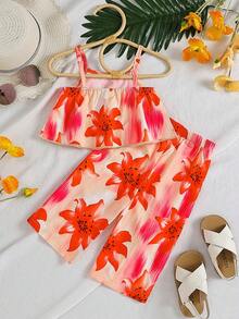 SHEIN 两件套女童碎花宽松吊带背心+裤子，度假风休闲夏季套装。色彩缤纷的碎花吊带背心套装，采用舒适透气的面料，宽松版型设计，适合女孩日常穿着、户外玩耍或夏季家庭聚会。 - 彩色 - 查看 2
