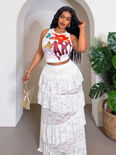 Slaydiva Bộ đồ mùa xuân/hè mới gồm áo tank top không tay ôm sát in hoa và chữ, kết hợp với chân váy ren voan nhiều lớp màu trắng, thích hợp cho kỳ nghỉ, lễ hội âm nhạc, bãi biển, mặc hàng ngày, lễ hội hóa trang, gợi cảm, tắm nắng, hợp thời trang, ngọt ngào, dễ thương, giản dị.