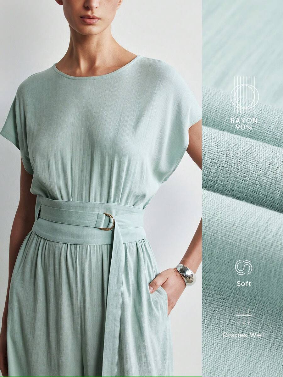 Aalyst Bộ jumpsuit nữ màu trơn cổ tròn tay raglan ngắn eo thắt dây điều chỉnh được với khóa chữ D bằng kim loại, túi, ống rộng suông, màu xanh ô liu, thanh lịch, cổ điển kiểu Pháp, thích hợp cho công sở, đi biển, nghỉ lễ, tiệc trà chiều, dạo phố, phong cách tối giản, đa năng, hàng mới về mùa xuân/hè.