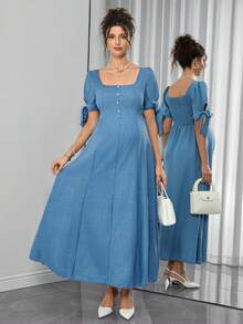 Đầm bầu có dây buộc nơ, xếp ly, cài cúc phía trước, dáng chữ A, tay ngắn. - Màu xanh nhạt - Xem 3