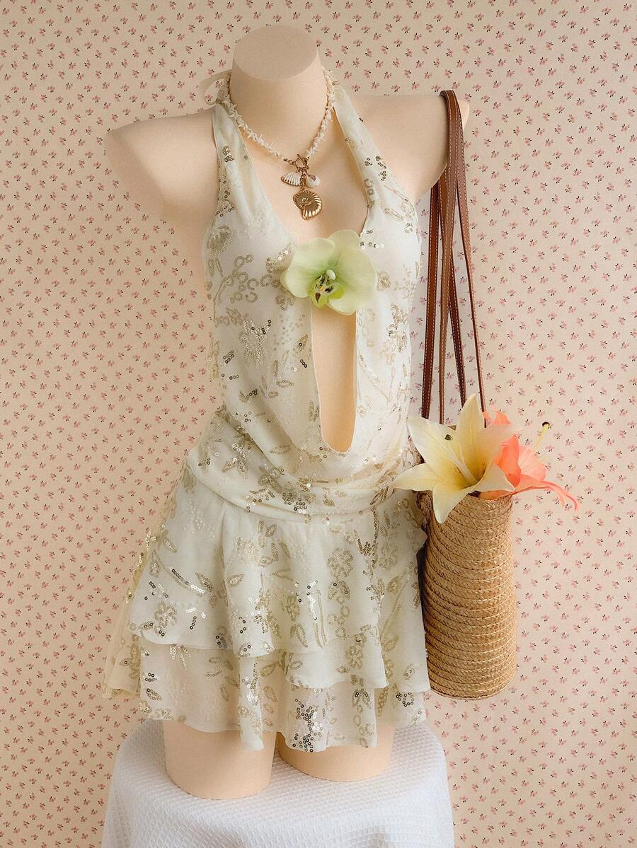 Comfortcana Vestido mini sexy con estampado floral, decoración de lentejuelas y cuello halter con lazo para mujer, ideal para vacaciones y citas - Albaricoque - Ver 1