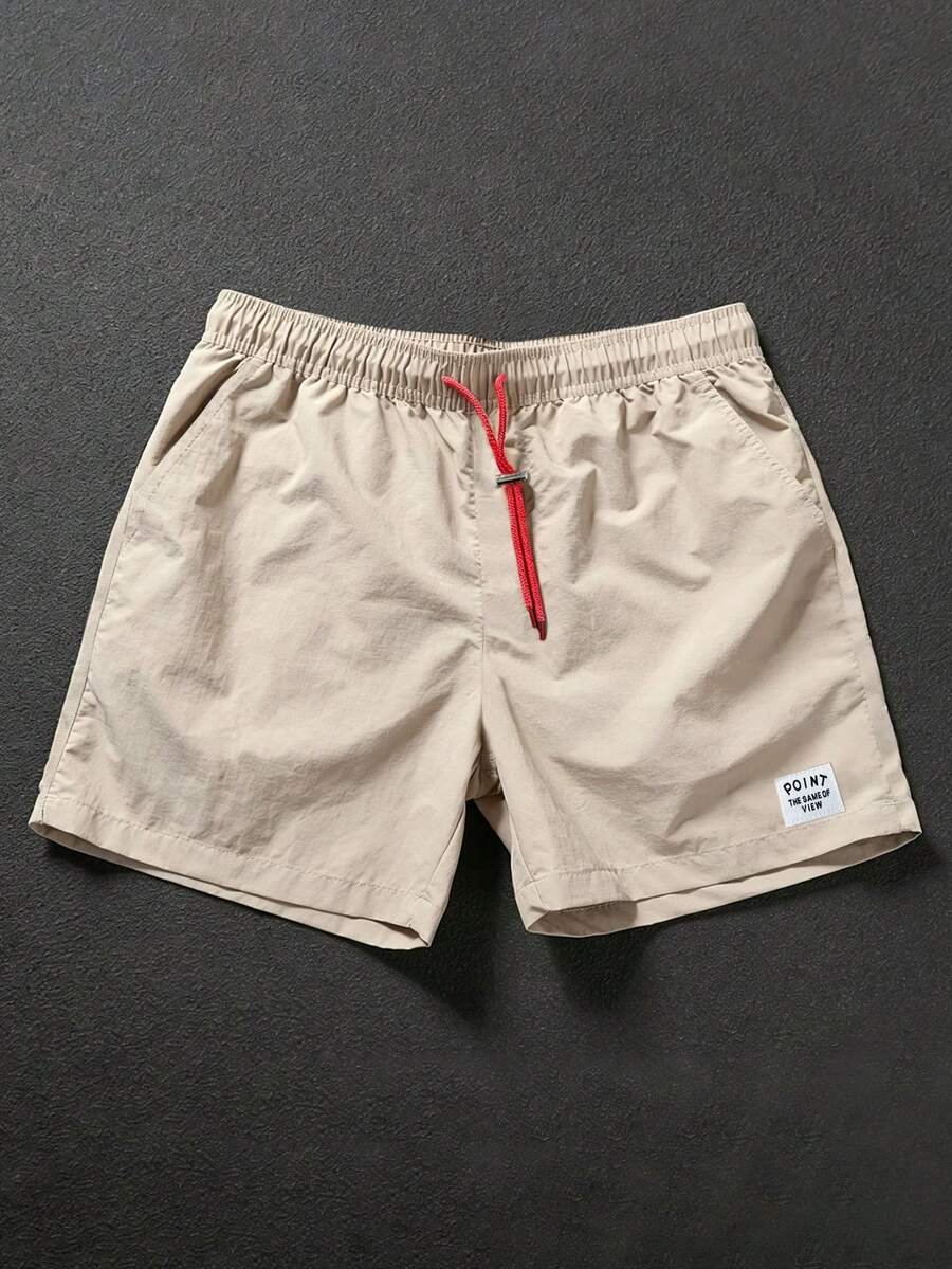 Manfinity Homme 男士休闲弹力腰带红色抽绳短裤,品牌设计,适合日常穿着、旅行、海滩和度假。这款短裤是度假旅行的必备单品,也是送给男友或老公的绝佳礼物。 - 杏色 - 查看 1
