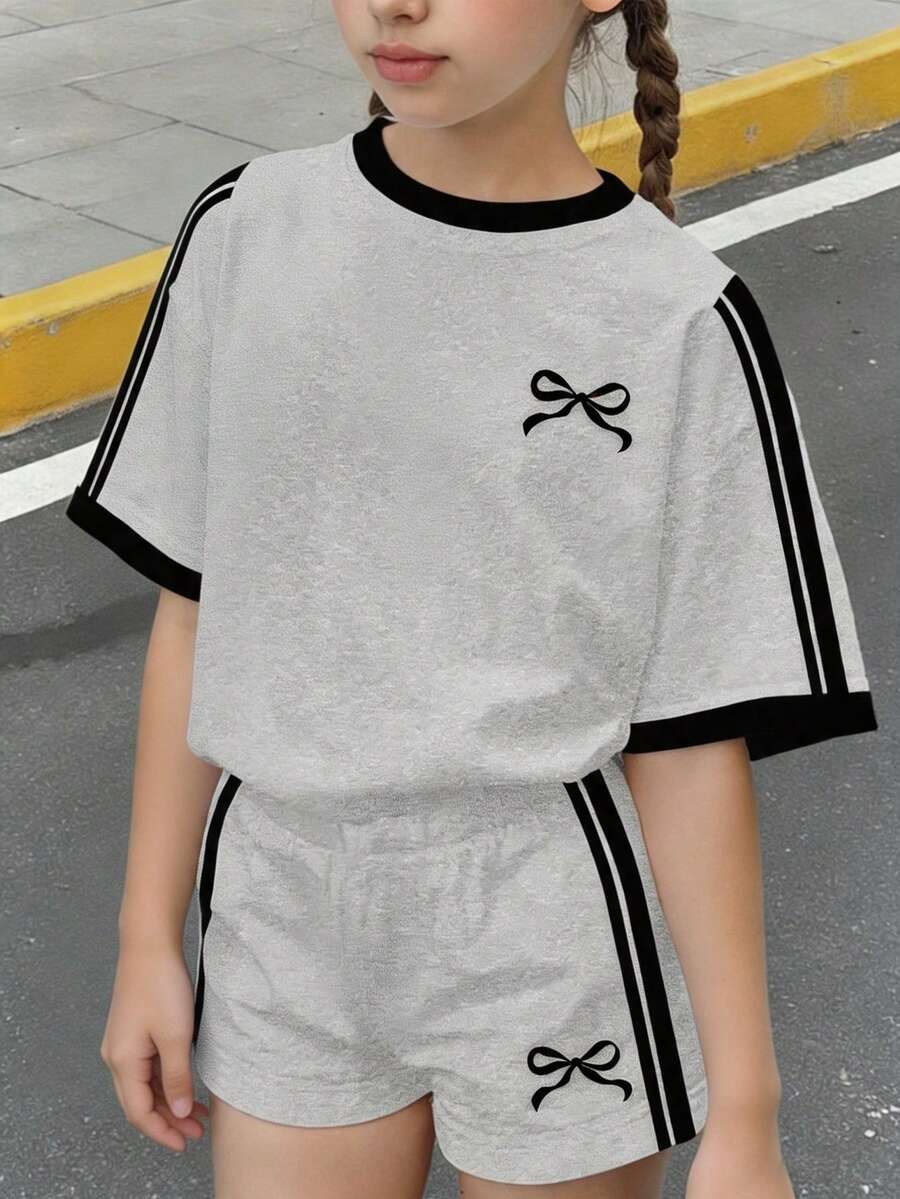 两件套少女休闲蝴蝶结条纹短袖T恤短裤套装,适合夏季和秋季穿着,舒适透气,适合秋季叠穿,时尚百搭,休闲百搭,儿童印花服装,返校季、秋季服装、返校节服装,佐伊套装,少女套装,夏季清凉少女套装,女童服装,少女服装,两件套 - 彩色 - 查看 1