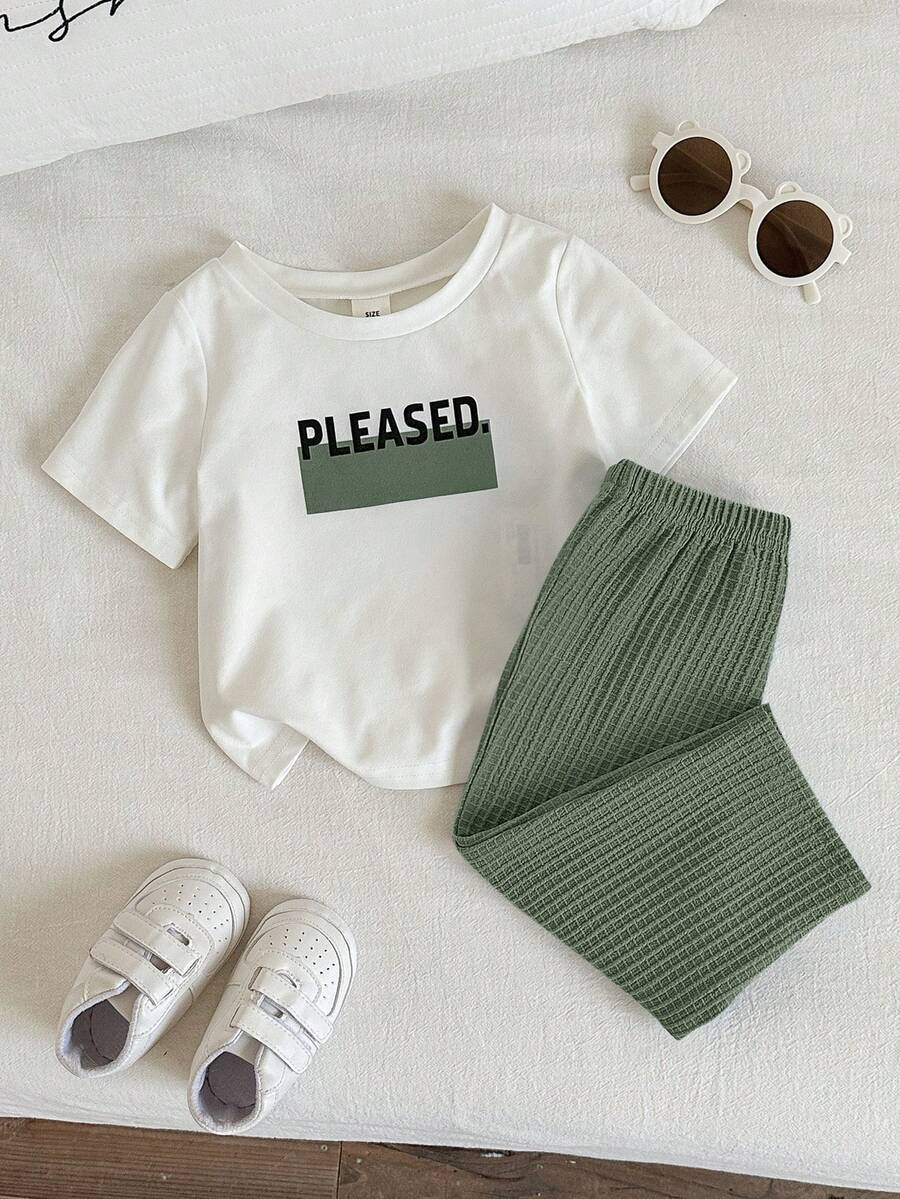 SHEIN 2pcs Baby Boys/Girls Cute Casual Waffle Fabric Short Sleeve Pants Pajama Set, Suitable For Home, Daily Wear And Outings, Spring/Summer - Multicolor - View 1