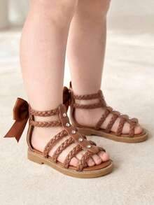 Cozy Pixies Một đôi sandal đế bằng kiểu La Mã dễ thương, đa năng, mang phong cách bohemian, lý tưởng cho kỳ nghỉ hè, thích hợp cho bé gái, kiểu dáng giản dị, thoải mái, có nơ và đan, thích hợp đi biển. - màu nâu - Xem 2