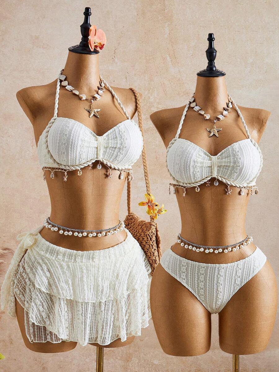 Bellisia Bộ đồ bơi 3 mảnh dành cho nữ, màu be, ren họa tiết sao biển và bướm, kiểu yếm, gồm áo ngực và chân váy xếp tầng, chất liệu ren móc.