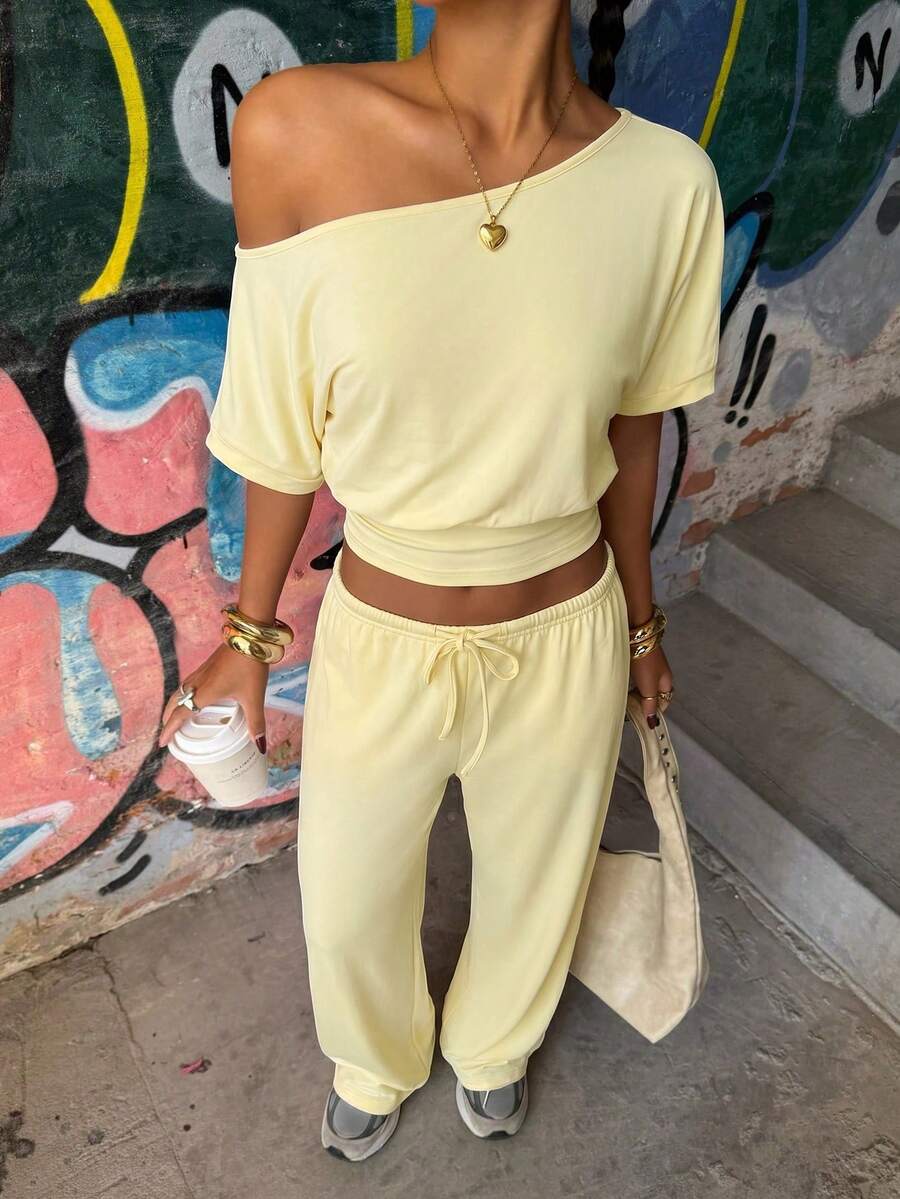Muchica Women's Summer Pale Yellow 2 Pieces Set,Asymmetric Collar Short Sleeve Top & Knotted Long Pants Casual Loungewear,Travel Vacation Outfit Occasion Set - Pale Yellow - View 1