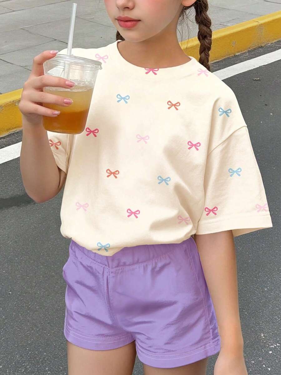 2件套少女休闲多巴胺马卡龙蝴蝶结印花短袖圆领T恤和短裤套装,适合春夏日常、外出、度假、校园等场合,淡紫色 - 彩色 - 查看 1