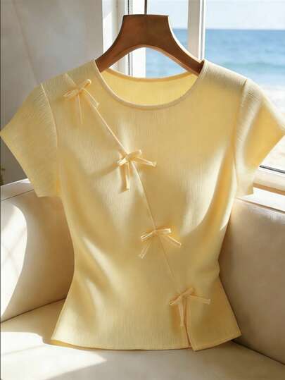 SHEIN Franclia Women's Round Neck Bow-Decorated Short-Sleeved T-Shirt, Summer, Women's Summer Outfits, Women's Holiday Outfits, Juneteenth, Saint João, Party Outfits For Women During Saint João, Beach Outfits, Beach Outfits, Outing Outfits, Women's Birthday Outfits, Women's Vacation Outfits, Summer Holiday Outfits, Y2K, Women's Country Style, Country Concert Outfits, Women's Commuting Outfits, Women's Elegant Suits, Women's Casual Suits, Yellow Tops, Yellow Shirts, Women's Graphic T-Shirts, Summer Tops, Party Tops, Work Tops, Women's Formal Shirts, Women's Social Tops, Women's Formal Wear, Outing Tops, Women's Casual Tops, Skirt Tops