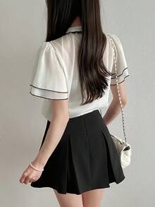 FRIFUL Bộ đồ 2 mảnh dành cho nữ, gồm váy cổ cao xếp lớp phối màu tương phản, viền bèo nhún và cổ nơ, dáng chữ A, thích hợp cho mùa hè. - Đen và trắng - Xem 8