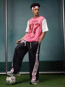 EVRINFINITE Camiseta de cuello redondo para hombre, estilo universitario de deportes y ropa urbana con estampado gráfico de manga corta - Rosa - Ver 7