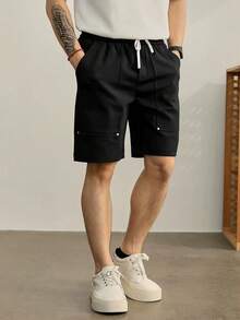 Manfinity Homme 男士休闲弹力腰贴袋铆钉直筒短裤，适合日常休闲穿着、周末外出、旅行、与朋友聚会等场合。这款短裤是男士衣橱中不可或缺的百搭单品，也是送给男友或丈夫的绝佳礼物。 - 黑色 - 查看 4