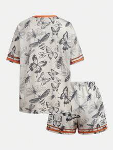 SHEIN Girlism Bộ đồ thể thao nữ tuổi teen gồm áo thun tay ngắn cổ chữ V dáng rộng và quần short, chất liệu vải lưới, thích hợp cho mùa hè và hoạt động thể thao, có in số 24 lớn và họa tiết cành cây rằn ri. - Màu Cam san hô - Xem 3