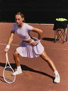 GLOWMODE Váy tennis xếp ly siêu nhẹ FeatherFit™-Air Sunny Rally thấm hút mồ hôi, chống nắng, có quần short tích hợp và túi bên hông, thích hợp cho tennis, golf, pickleball và mặc hàng ngày. - Màu tím - Xem 8
