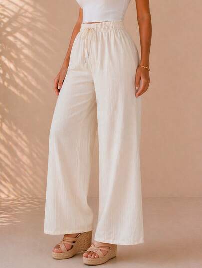Pantalón de pierna ancha para mujer, elegante y casual. Tela de poliéster, apto para cualquier temporada, ajuste de cintura natural con resorte ligero y cordón ajustable. Sin bolsillos. Textura lisa sin estampados. Interior muy fresco, ligero y cómodo, ideal para el uso diario.