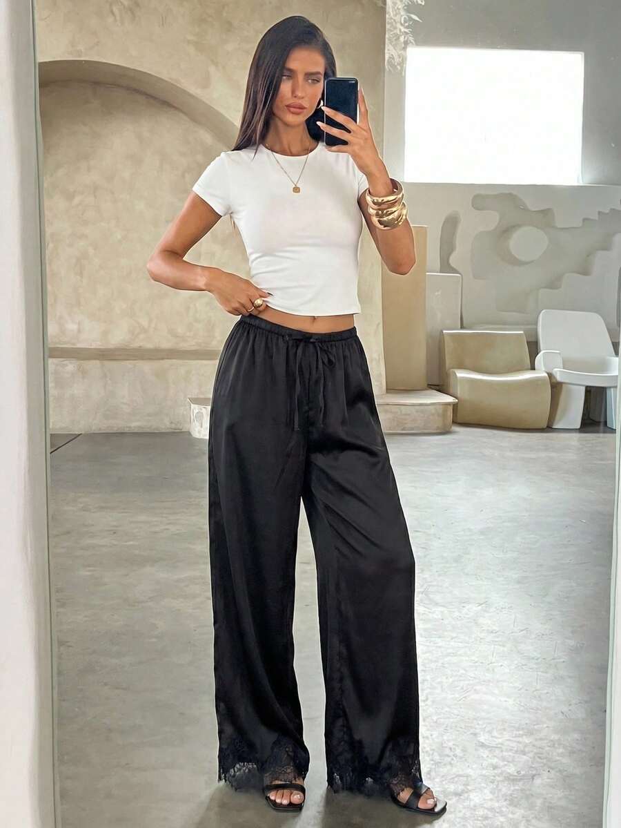 Aloruh Quần dài nữ cạp thấp, kiểu dáng retro, màu đen, chất liệu satin, phù hợp với phong cách bohemian, chất liệu satin, vải lụa, satin phối ren, ống rộng, nhẹ, thích hợp cho mùa hè. - màu đen - Xem 1