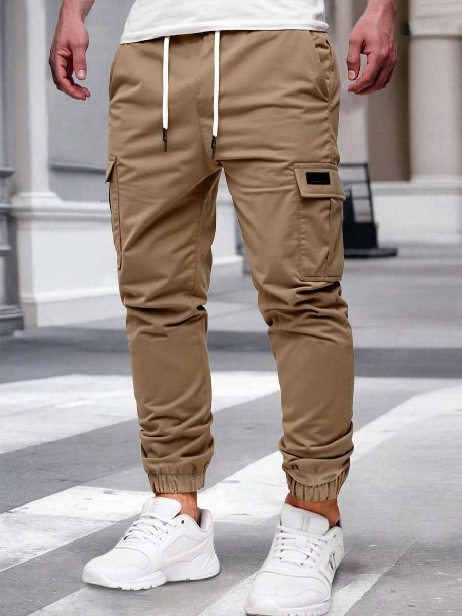 Manfinity Homme 男士成熟休闲工装裤,适合日常休闲穿着、周末郊游、户外活动、旅行探险以及年轻人的社交场合。这款裤子是男士衣橱中不可或缺的百搭单品,也是送给男友或丈夫的绝佳礼物。 - 卡其色 - 查看 1