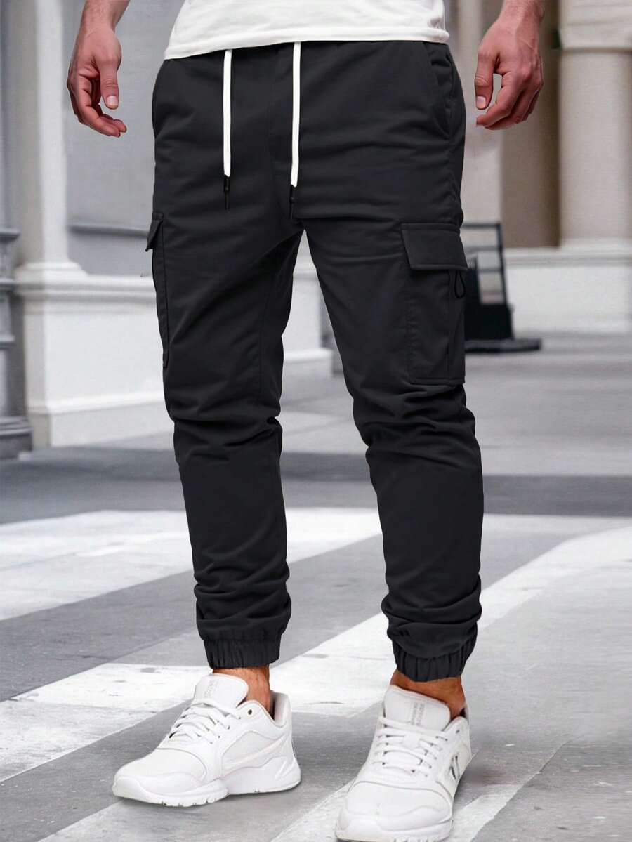 Manfinity Homme 男士成熟休闲多口袋工装裤,适合日常休闲穿着、周末外出、旅行、朋友聚会等场合。这款裤子是男士衣橱中不可或缺的百搭单品,也是送给男友或丈夫的绝佳礼物。 - 黑色 - 查看 1