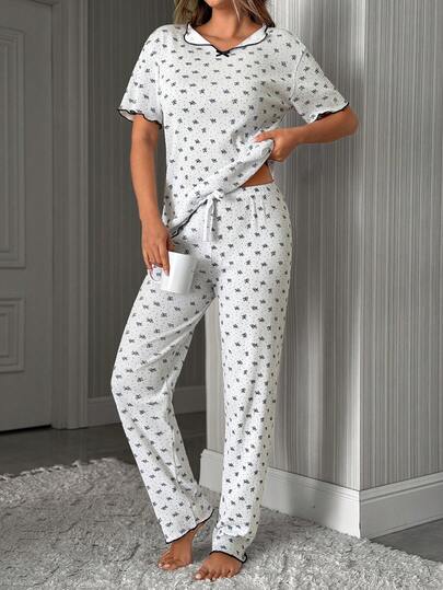 SHEIN Soft Ribbed Ditsy Floral Print Bow Detail Short Sleeve Pajama Top & Ruffle Shorts Casual Lounge Set
