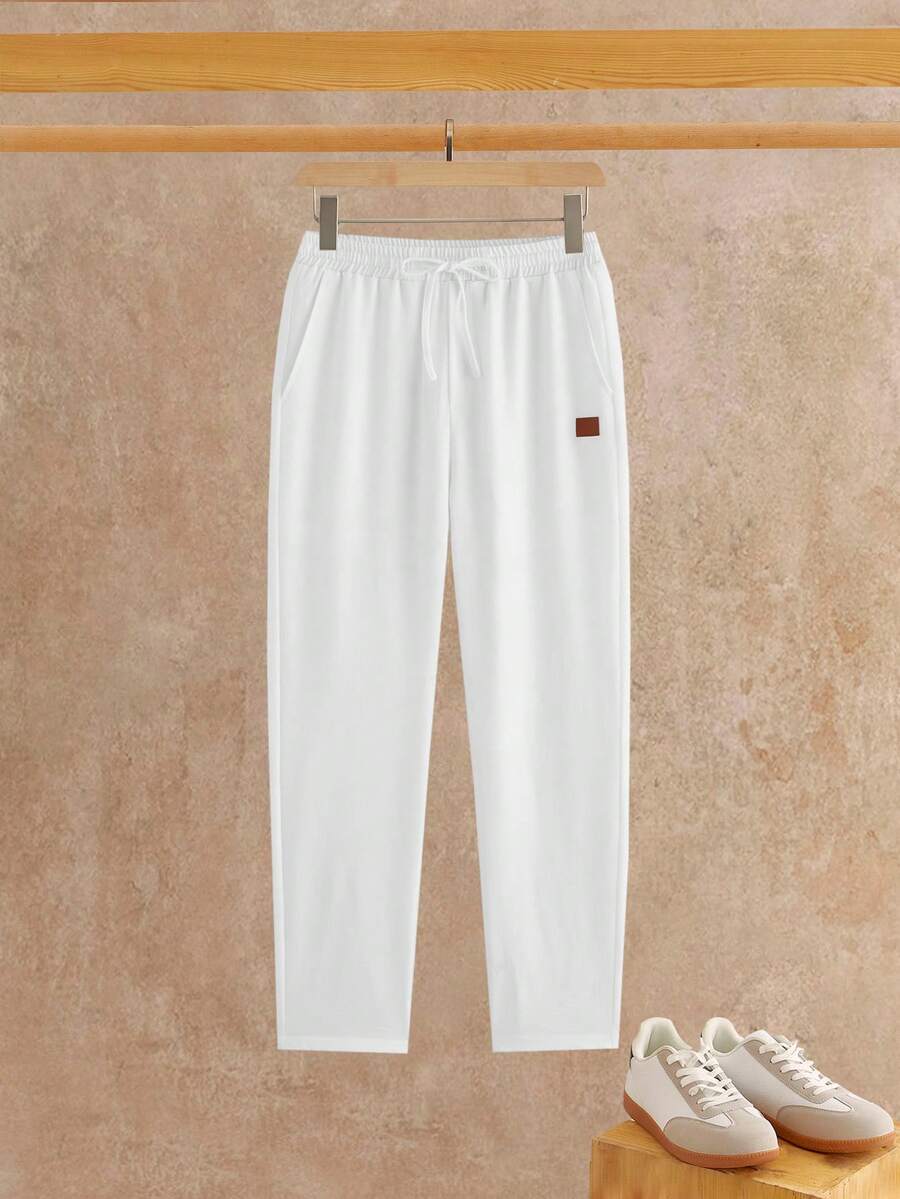 HIMLAND Pantalones largos casuales de uso diario y para ir al trabajo, con cintura de cordón, de estilo minimalista y versátil para hombres - Multicolor - Ver 1