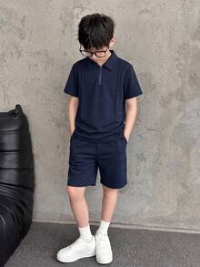SHEIN 男童海军蓝简约廓形 Polo 衫，休闲学院风，舒适时尚，百搭柔软面料，适合日常穿着、上学、旅行、返校季、假日派对、夏季海滩度假、春夏穿着。 - 寶藍色 - 查看 5