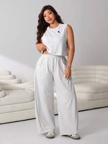 Solflare Bộ 2 món gồm áo crop top không tay thêu hình ngựa màu đen và quần ống rộng cạp chun, thích hợp cho các dịp thường ngày, dự tiệc, đi làm, lễ hội âm nhạc, đi học, nghỉ mát biển, thời trang đường phố, mặc nhà, dạo phố, và cả size lớn. - Màu Xám nhạt - Xem 4