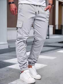 Manfinity Homme 男士成熟休闲多口袋工装裤，适合日常休闲穿着、周末外出、旅行、朋友聚会等场合。这款裤子是男士衣橱中不可或缺的百搭单品，也是送给男友或丈夫的绝佳礼物。 - 淺灰色 - 查看 3