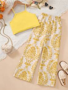 Sparklyn 2 pièces Ensemble léger d'été pour les jeunes filles, comprenant un débardeur à volants jaune pâle avec une ambiance jeune et ludique, associé à un pantalon ample et flatteur à jambes larges dans un imprimé floral vintage sur fond blanc. La palette de couleurs rafraîchissante et le design élégant et décontracté rendent cet ensemble polyvalent pour le port quotidien, les vacances et les séances photo décontractées, incarnant un look chic pour les jeunes préadolescentes. - Jaune citron - Voir 2