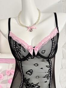 PetitDoll Bộ đồ lót ren gợi cảm 4 món dành cho nữ, bao gồm áo ngực ren, dây đeo tất, quần lọt khe và tất lưới. - màu đen - Xem 5