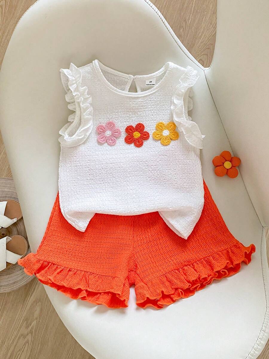 SHEIN Playful Pals 2件套女童白色和橙色针织波浪荷叶边柔软面料3D花朵圆领无袖荷叶边下摆上衣+松紧腰短款A字休闲甜美可爱套装,适合春夏日常穿着、上学、公园、旅行、摄影及各种场合。 - 橘色 - 查看 1