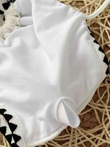 SHEIN Bộ đồ bơi Tankini cho bé gái tuổi teen, màu be với họa tiết zigzag và vỏ sò màu đen, áo hai dây dệt kim và quần short, trang trí khóa kim loại, thiết kế khoét rỗng, thích hợp cho bơi lội, kỳ nghỉ, đồ mặc đi biển mùa hè, đồ bơi trẻ em, kỳ nghỉ hè. - Màu be - Xem 6