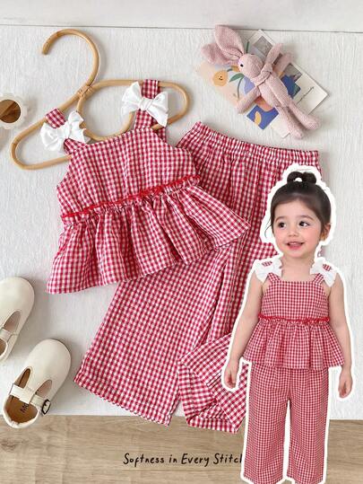 Cozy Pixies Bộ áo và quần short không tay kẻ caro nhún bèo đính nơ cho bé gái, thích hợp cho mùa hè.
