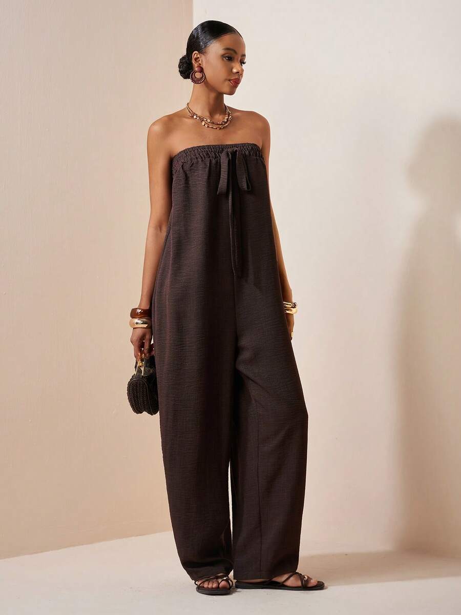 Zivah Bộ jumpsuit màu nâu dáng quây, thanh lịch, hiện đại, thích hợp cho kỳ nghỉ biển năm 2026, phong cách nghỉ dưỡng, đi làm, phong cách bohemian, có xếp ly phía trước, chất liệu độc đáo, chất liệu vải màu nâu, phong cách bohemian, thanh lịch, hiện đại, thích hợp cho đi làm. - màu nâu - Xem 1