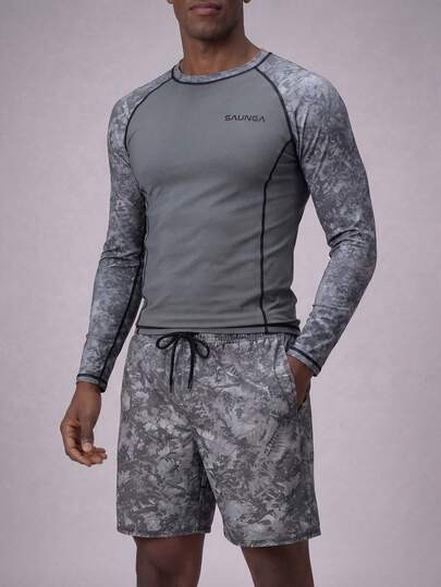 CoralVoy Conjunto de camiseta de manga larga con cuello redondo y estampado gráfico, y shorts de natación con cordón en la cintura para hombre