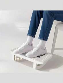 1 Giá đỡ chân bàn làm việc xoay 180° tiện dụng, chất liệu nhựa bền chắc với 8 lỗ thông gió, hỗ trợ nâng đỡ chân và điều chỉnh tư thế ngồi dưới bàn làm việc, màu trắng/đen, thiết kế đơn giản, cấu trúc chắc chắn, có thể dùng làm tấm lót chân hoặc ghế kê chân tại bàn làm việc. - Nhiều màu - A - miếng đệm chân - Xem 7