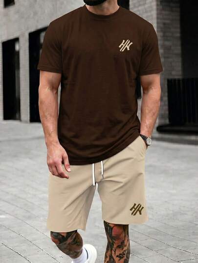 Manfinity LEGND Conjunto de top con cuello redondo y pantalones cortos con estampado de letras para hombres, conjunto de prendas cortas para hombres