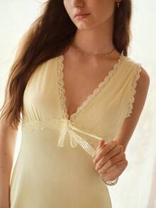 PREMIUM Bộ đồ ngủ nữ dệt kim phối ren gồm áo tank top và quần dài, mùa xuân/hè. - Màu vàng - Xem 1