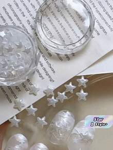 1盒白色3D星星美甲装饰 - 精致百搭的亚克力饰品，适用于韩式/日式美甲风格，沙龙品质，可用于DIY美甲，亚克力假指甲，专业美甲用品，适合派对、婚礼、日常佩戴，也是送给女性女孩的圣诞礼物，美甲宝石和水钻 - 彩色 - 查看 1