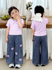 SHEIN Genkimix Kids 2件套女童（小号）春夏休闲时尚T恤套装。粉色纯色罗纹针织面料，正面蝴蝶结装饰，圆领短袖T恤上衣搭配粉色爱心贴布蓝色休闲牛仔裤。可爱、舒适、休闲时尚的套装，适合春夏日常、上学、外出、度假穿着。 - 紫色 - 查看 6