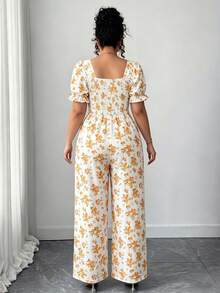 SHEIN Elenzya Bộ áo liền quần nữ cổ vuông họa tiết hoa nhí, tay cánh hoa, lưng hở, thắt nơ phía trước. - Màu vàng - Xem 2