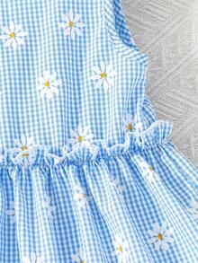 SHEIN Vintaside Kids 这款浅蓝色和白色格子连衣裙，饰以雏菊印花，散发着清新夏日气息。雏菊印花与格子图案的结合，赋予其质朴的乡村魅力，不对称的肩部蝴蝶结设计更添甜美独特之感。整体设计简洁清新，蓝白配色尤其衬托肤色。这款连衣裙非常适合在春末夏初穿着。 - 藍色 - 查看 5