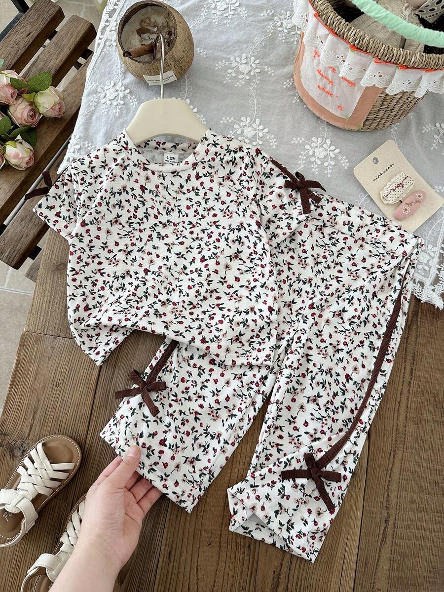 SHEIN 2pcs/Baby Girl's Summer Casual Two Pieces Set: Short-Sleeved Casual Floral Print Patchwork Top With Ribbon Bow And Long Pants - Multicolor - View 1
