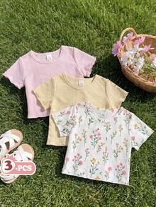 Vintaside Kids 这款女婴T恤采用优质柔软面料制成。经典圆领短袖设计，修饰肩颈线条，清新粉黄配色凸显面料轻盈舒适，白色款饰有花卉印花。适合日常休闲穿着、公园玩耍或家庭出游。 - 彩色 - 查看 4